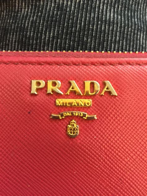 fake prada charm|prada purse logo.